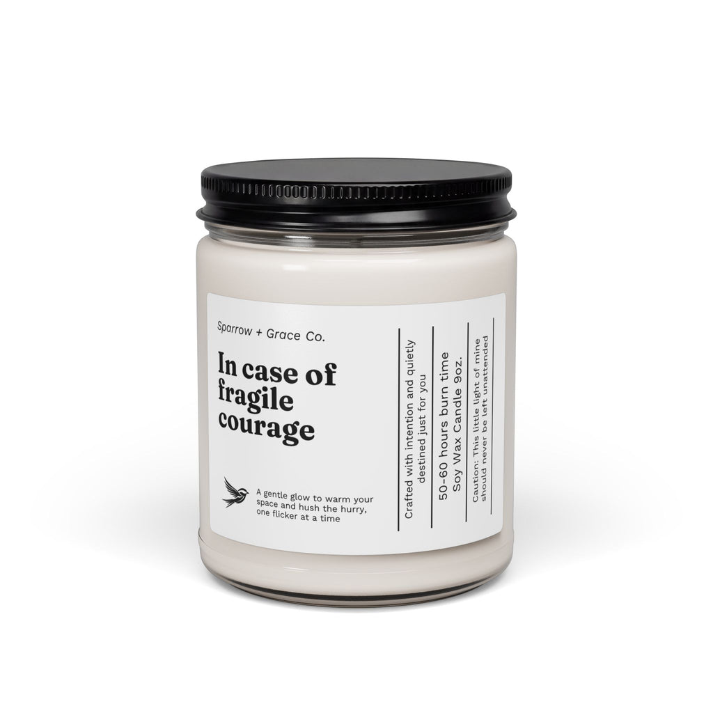 Candle jar with a black lid and white label on a white background
