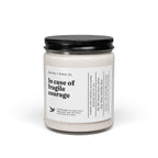 Candle jar with a black lid and white label on a white background